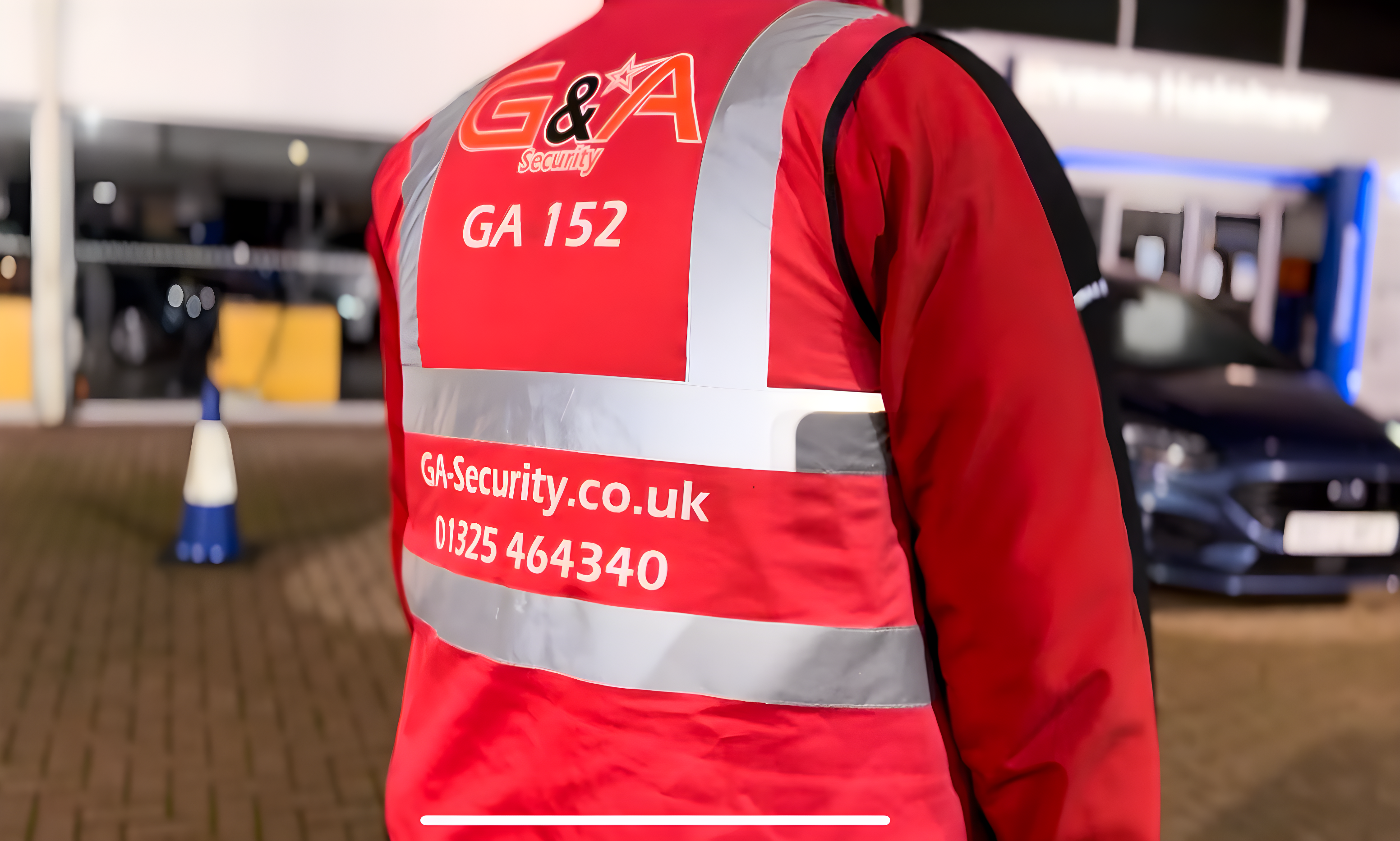 Back Red HiVis Red Coat on Forecourt
